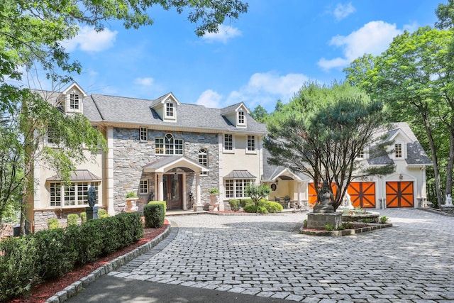 view of front of property featuring a garage