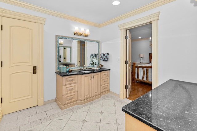 bathroom with vanity, tile patterned floors, and ornamental molding