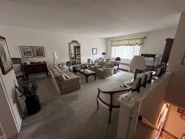 carpeted living room with radiator