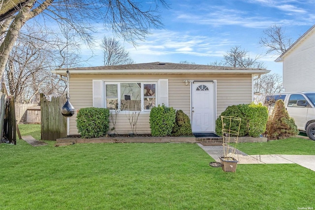 view of front of property with a front lawn