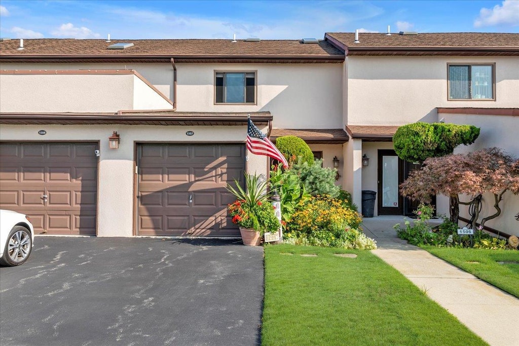 view of property featuring a garage