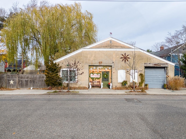 view of front of property featuring a garage