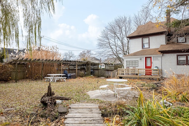 view of yard featuring a wooden deck