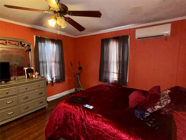 bedroom with an AC wall unit, dark hardwood / wood-style flooring, ceiling fan, and crown molding