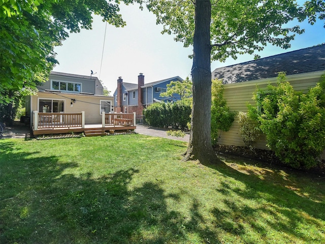 view of yard with a deck