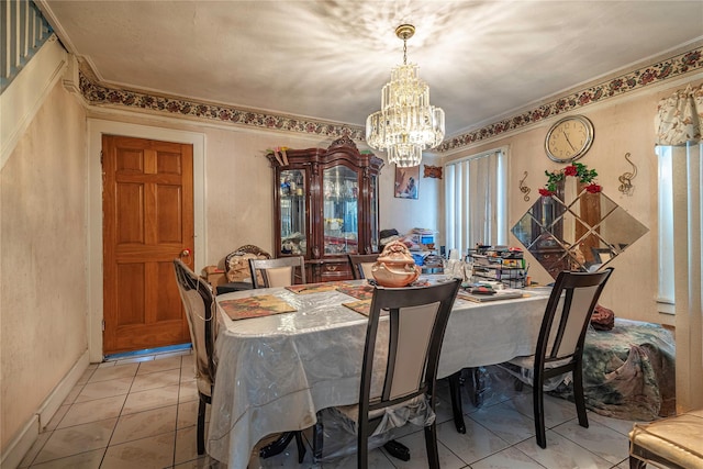 218-25 101st Ave, Queens Village, NY 11429 - tiled dining room with a chandelier, ornamental molding, and baseboards