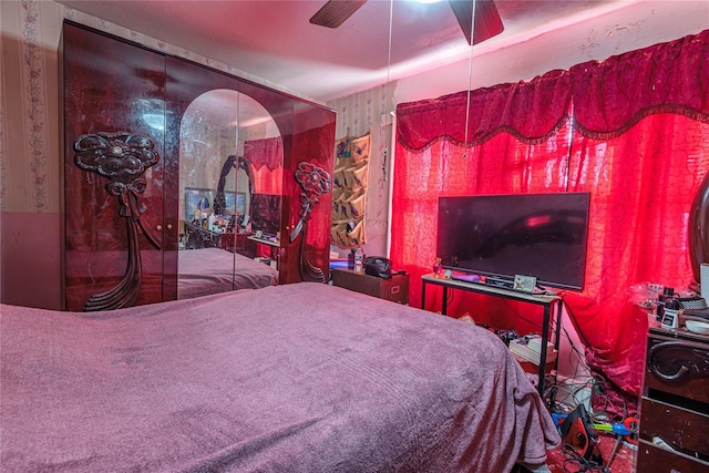 bedroom featuring carpet flooring and ceiling fan