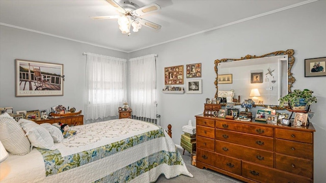 bedroom featuring carpet, ceiling fan, and crown molding