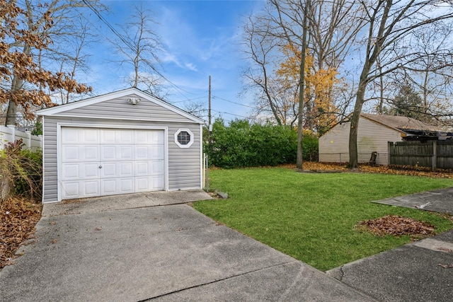 garage with a yard