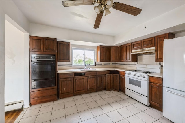 kitchen with tasteful backsplash, white appliances, ceiling fan, sink, and light tile patterned flooring