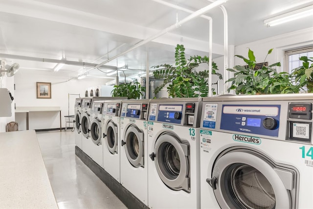 washroom featuring independent washer and dryer