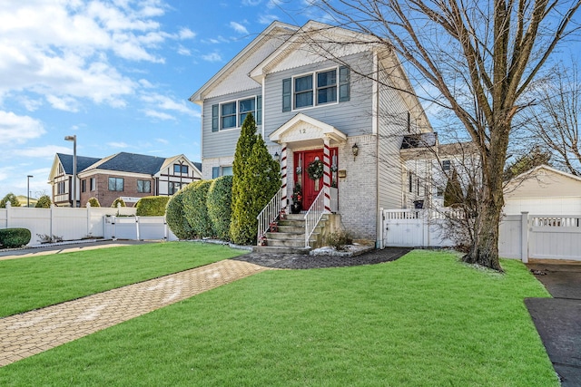 view of front of home with a front yard