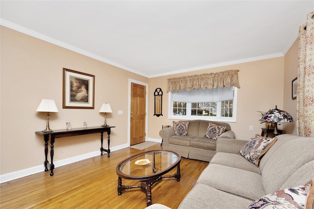 living room featuring hardwood / wood-style floors and ornamental molding