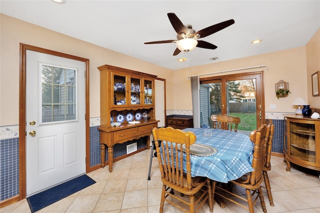 dining room featuring ceiling fan and light tile patterned floors