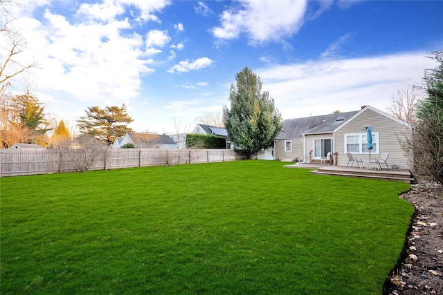 view of yard featuring a wooden deck