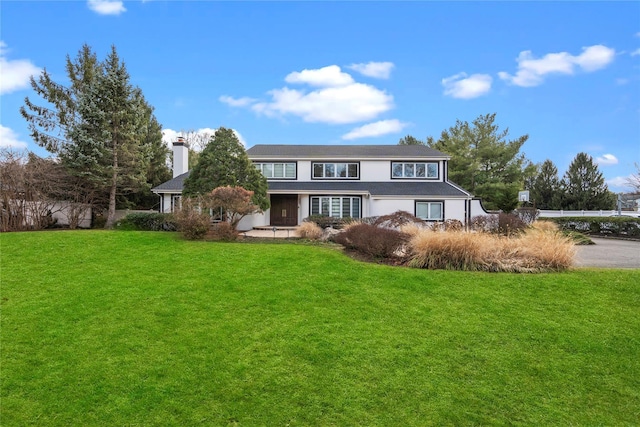 view of front property with a front yard