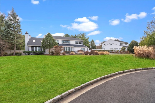 view of front property with a front yard