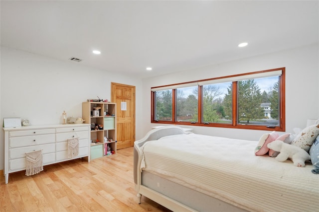 bedroom featuring light hardwood / wood-style flooring