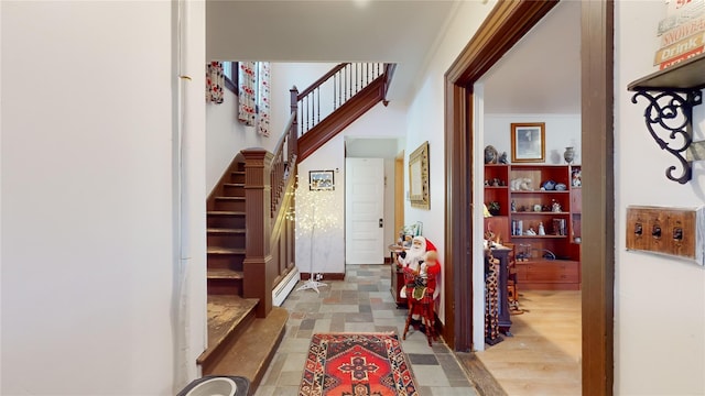 4 Elizabeth St, Port Jervis, NY 12771 - foyer with baseboard heating and stairway