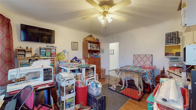 game room with ceiling fan and hardwood / wood-style flooring