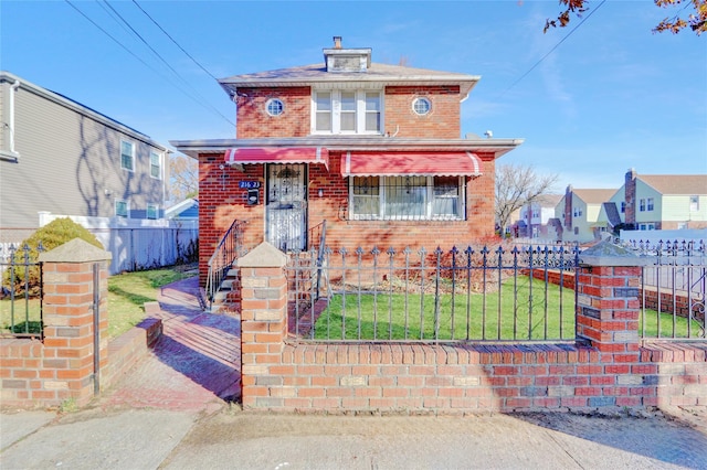 view of front of home featuring a front yard