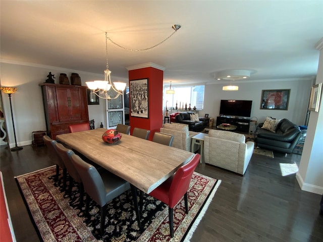 dining area featuring a notable chandelier, dark hardwood / wood-style floors, and ornamental molding