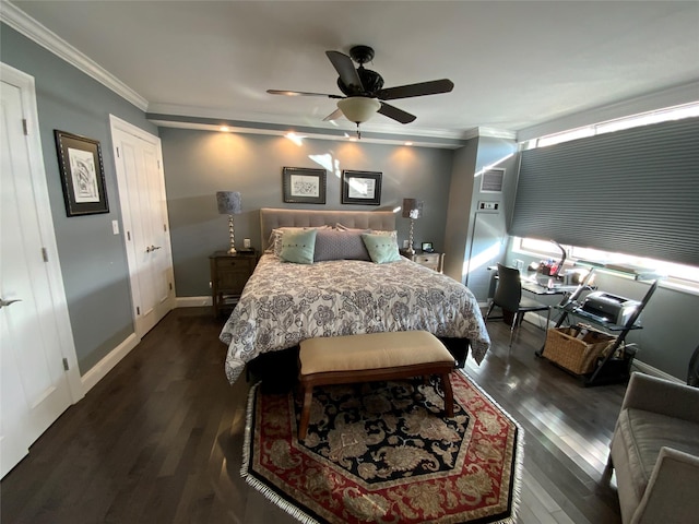 bedroom with dark wood-type flooring, ceiling fan, and crown molding