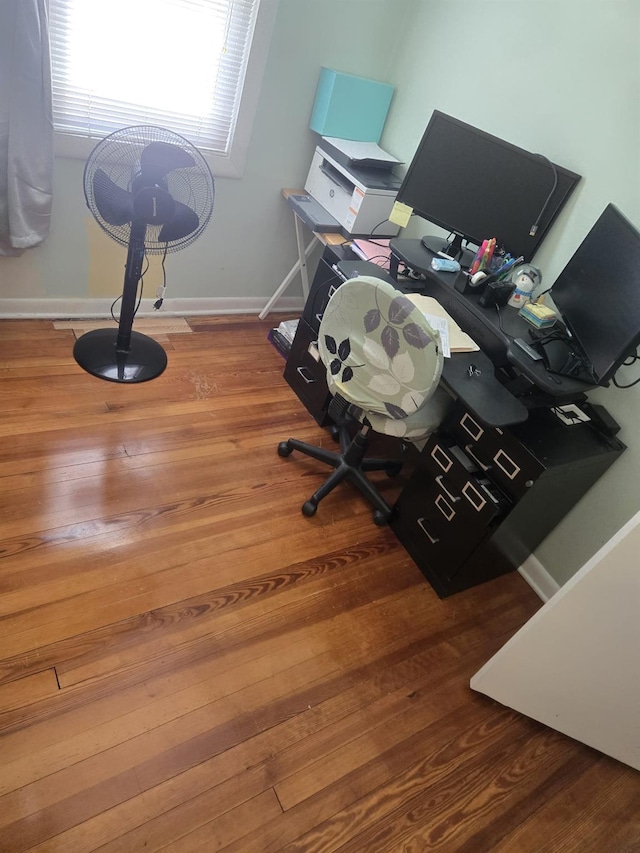 office area with hardwood / wood-style flooring