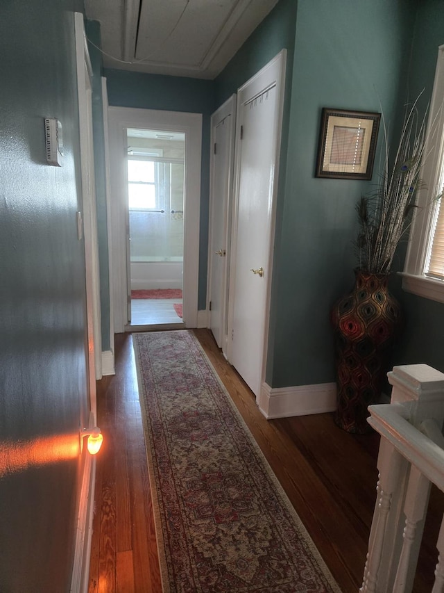 hallway featuring hardwood / wood-style flooring