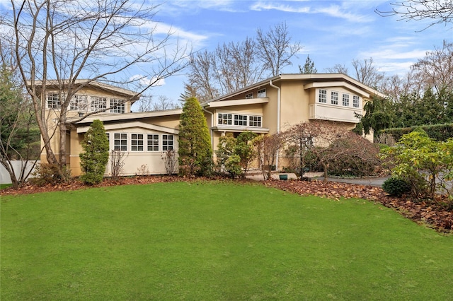 exterior space featuring a front lawn