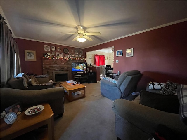 carpeted living room with crown molding, a fireplace, and ceiling fan