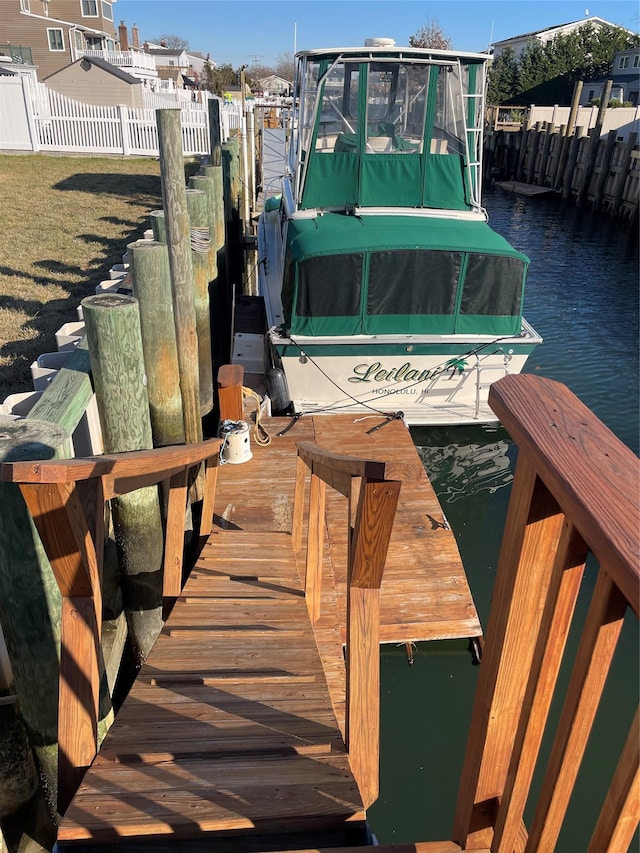 dock area featuring a water view