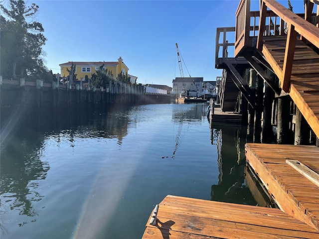 view of dock with a water view