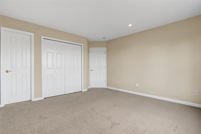 unfurnished bedroom with carpet flooring