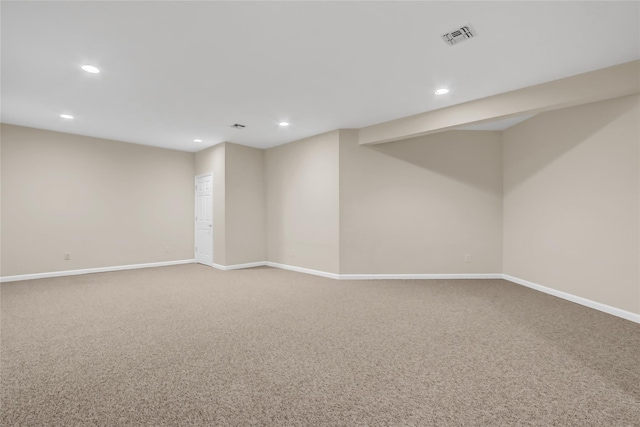 basement featuring carpet flooring