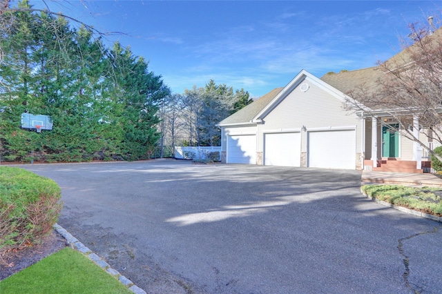 view of side of property featuring a garage