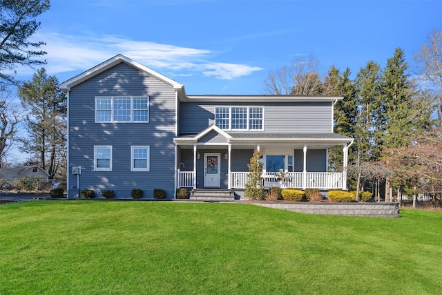 view of front of property featuring a front yard and a porch