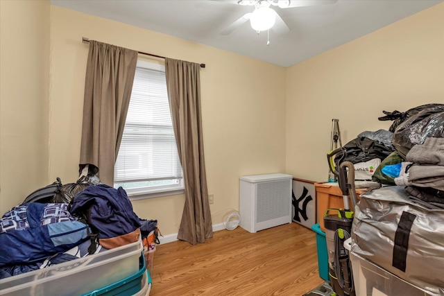 misc room featuring light wood-type flooring and ceiling fan