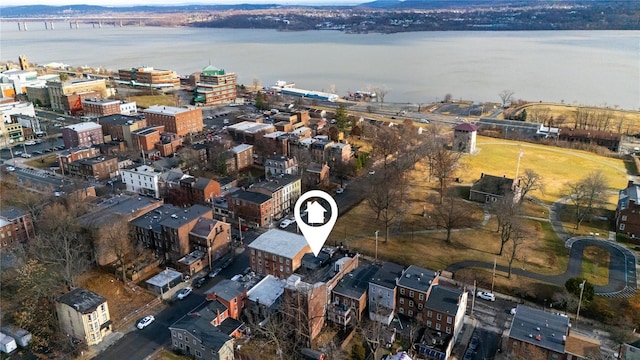 birds eye view of property featuring a water view