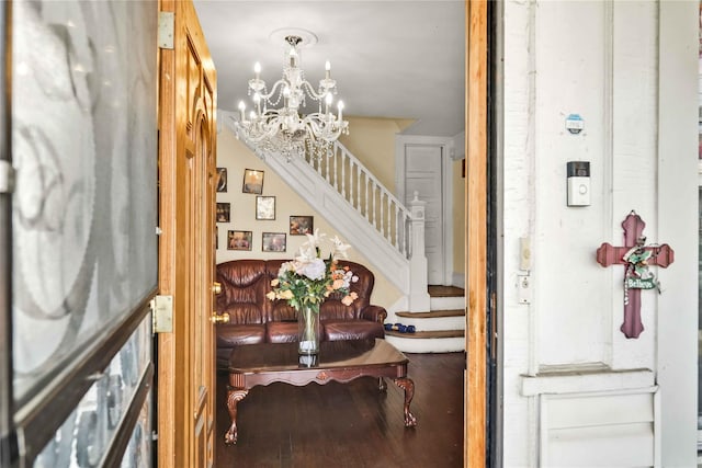 entryway featuring hardwood / wood-style floors and a chandelier