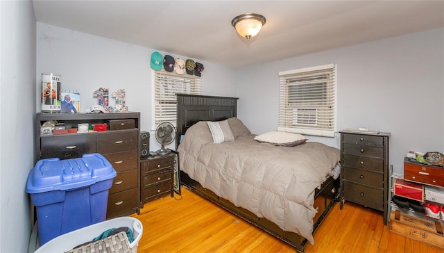 bedroom with light hardwood / wood-style flooring