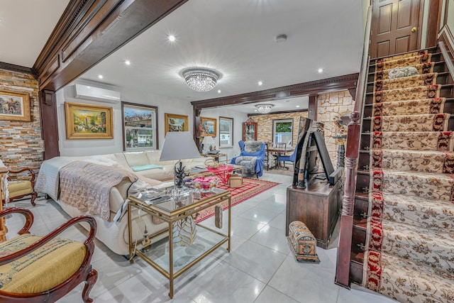 living room featuring light tile patterned flooring, a wall mounted air conditioner, and ornamental molding