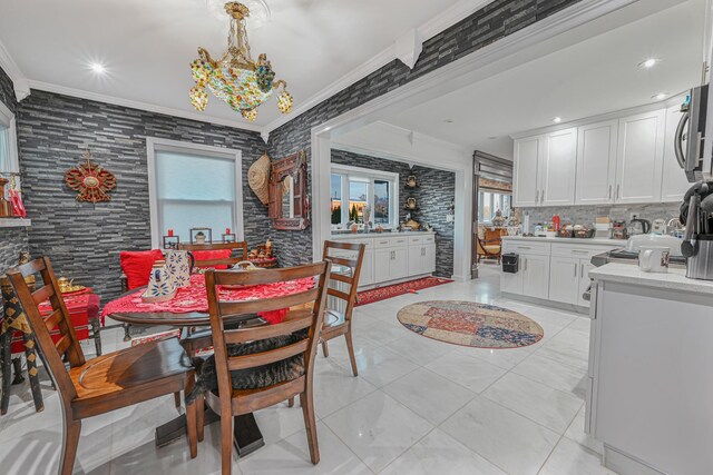 dining area with ornamental molding and light tile patterned flooring