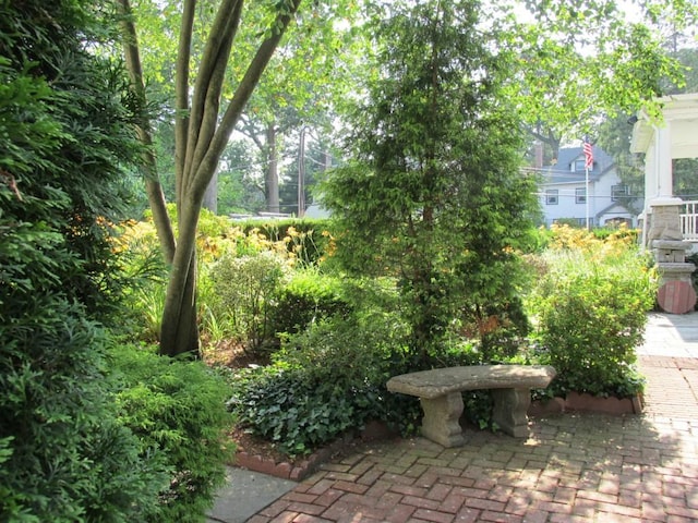 view of property's community featuring a patio