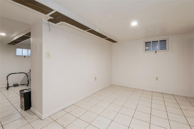 basement with light tile patterned floors