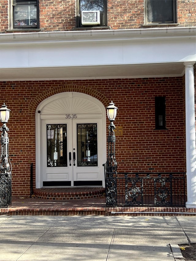 entrance to property featuring french doors