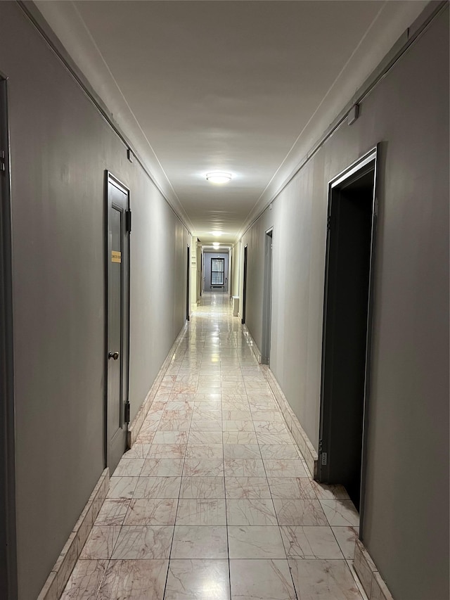 corridor featuring ornamental molding