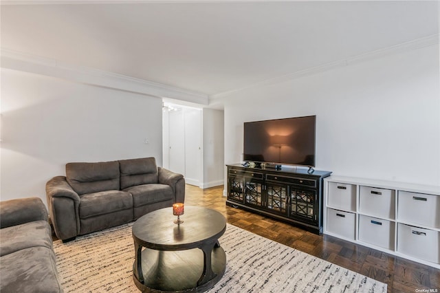 living room featuring dark parquet flooring and ornamental molding