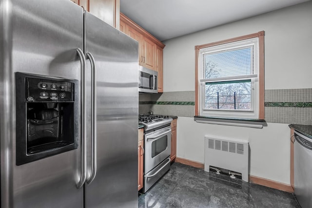 kitchen featuring stainless steel appliances and radiator