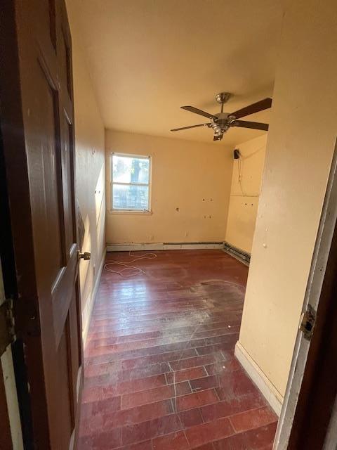817 Southard St, Baldwin, NY 11510 - unfurnished room featuring a ceiling fan, baseboards, and brick patterned flooring